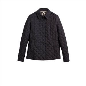 Burberry black quilted jacket.